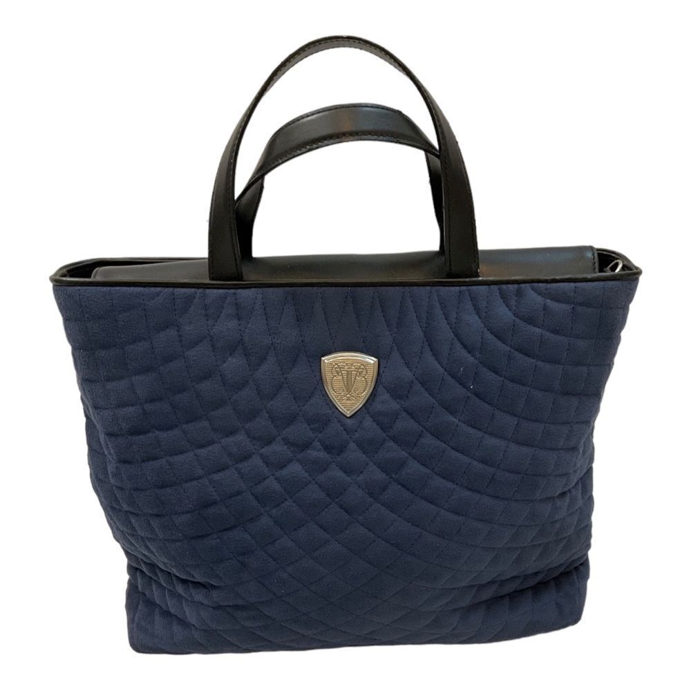 Blaine Trump Women’s Blue Quilted Fabric Handbag Size Medium.